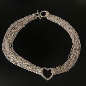 Sterling silver heart necklace.